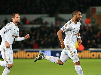 Ashley Williams leads from the...